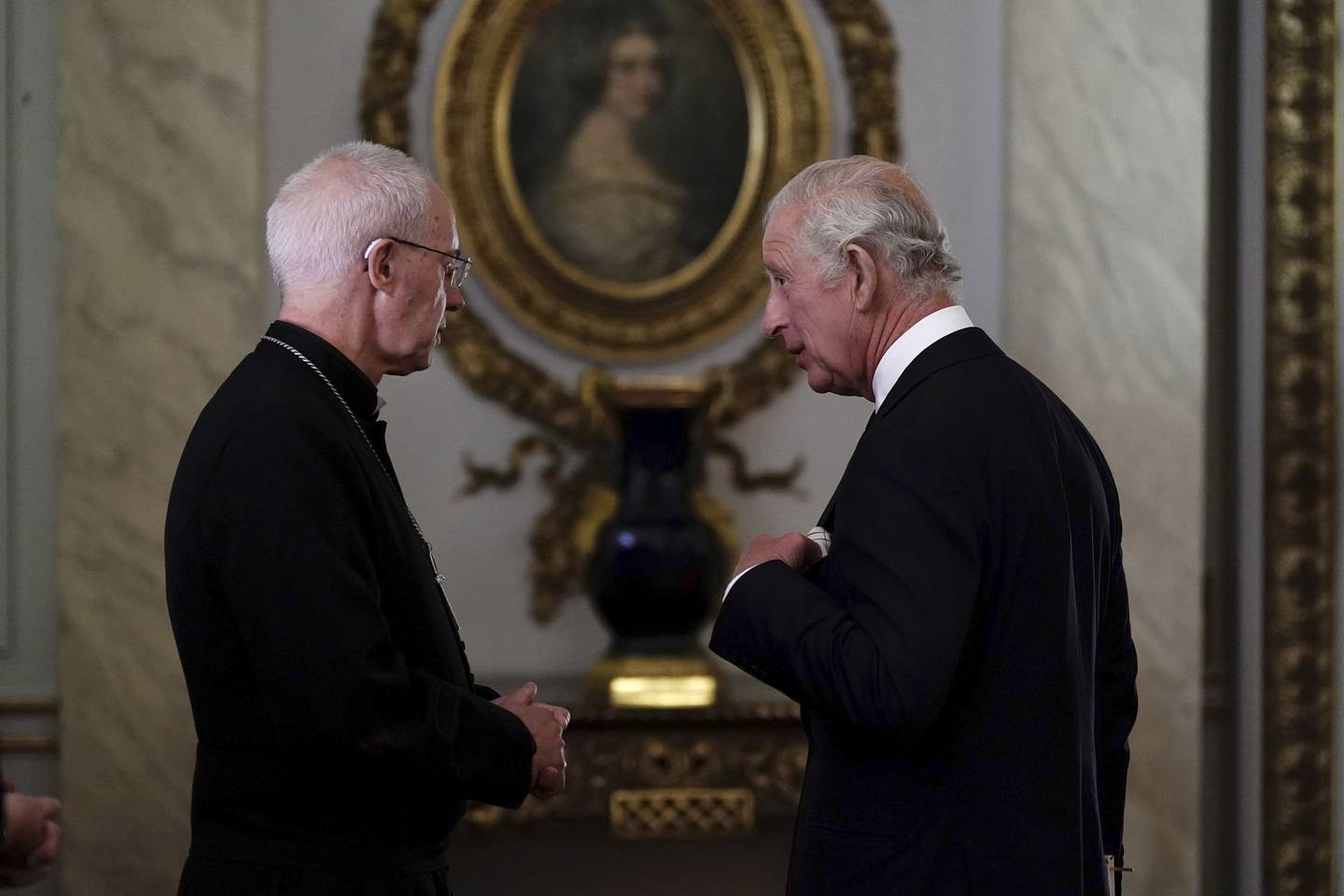 King Charles speaks to the Archbishop of Canterbury, Justin Welby, as he meets faith leaders during a reception at Buckingham Palace. AP