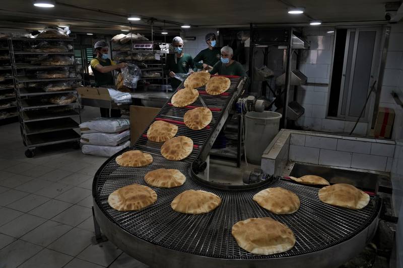 Bread coming off a production line at an automated bakery in Beirut. Russia’s war in Ukraine threatens food supplies in countries such as Lebanon, which depends on the Black Sea region for nearly all of its wheat. AP