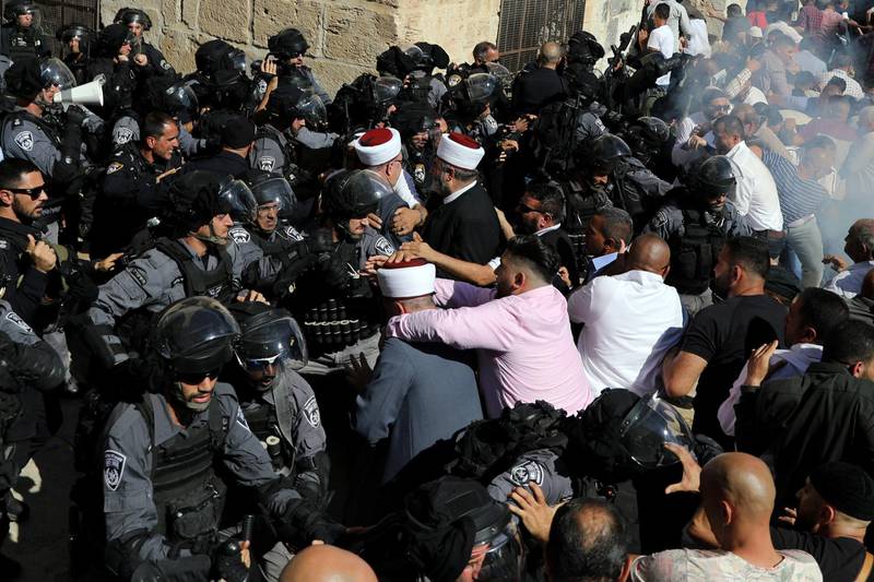 Israeli police clash with Palestinian worshippers in Jerusalem's Old City. Reuters