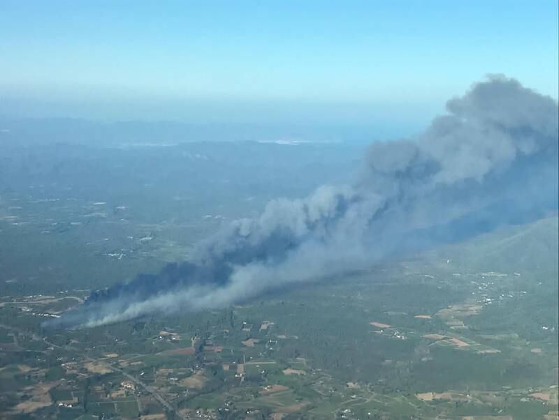 An aerial view of smoke rising from the wildfires in southern France.