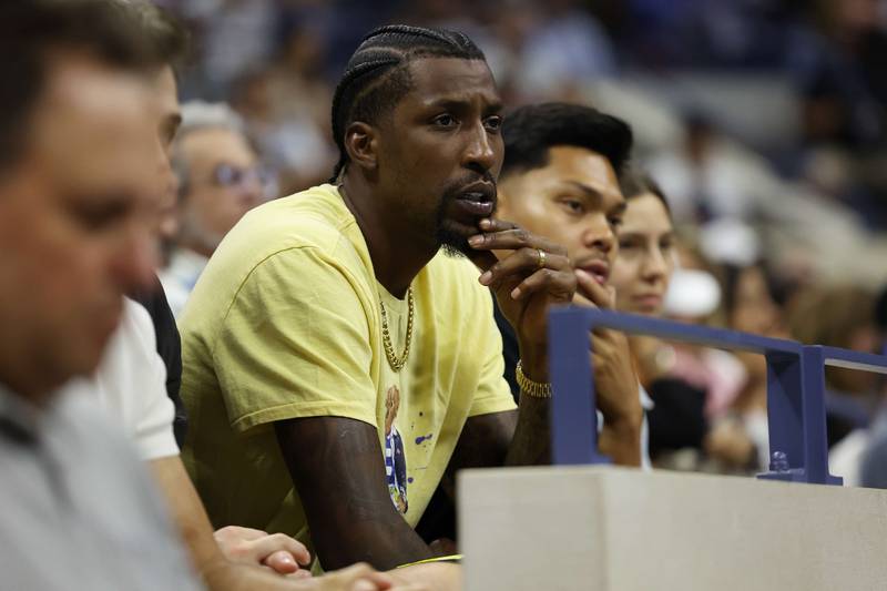 NBA player Kentavious Caldwell-Pope watches the semi-final between Carlos Alcaraz and Frances Tiafoe. AFP