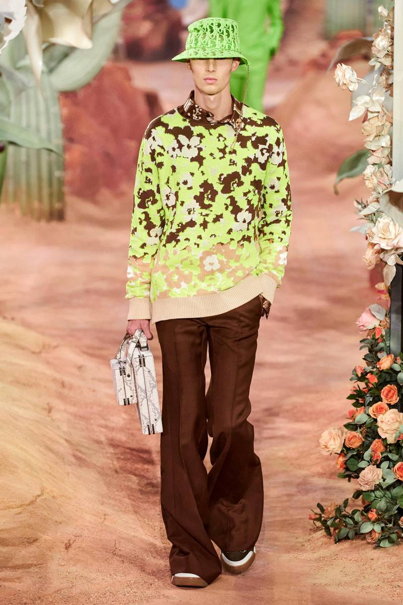 At Dior, Kim Jones teamed up with rapper Travis Scott for spring / summer 2022, using many of the singer's personal style picks, such as slim-fit flared trousers. Courtesy Dior