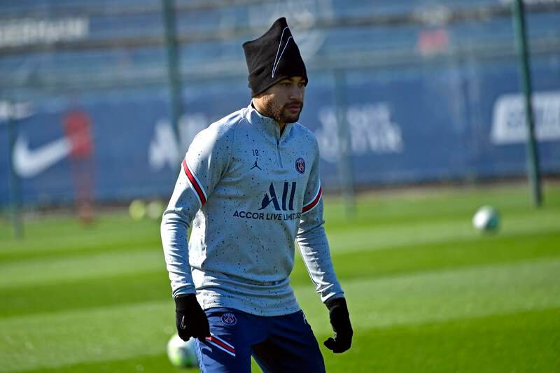 Neymar Jr looks on during a Paris Saint-Germain training session at Ooredoo Center on March 18, 2022 in Paris, France. 