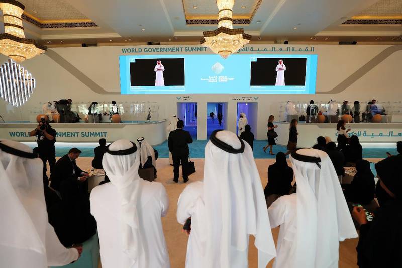 Attendees at the World Government Summit watch Crown Prince of Dubai Sheikh Hamdan bin Mohammed speak. Chris Whiteoak / The National
