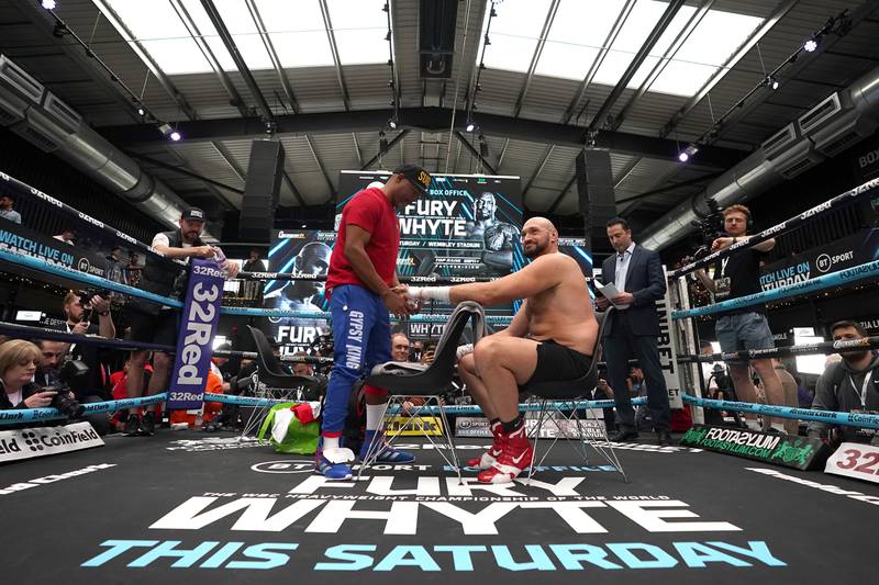 Tyson Fury with trainer SugarHill Steward during an open workout at BOXPARK Wembley. PA
