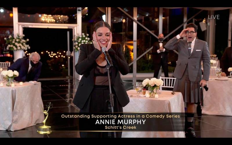 Annie Murphy (L) wins the Emmy for Outstanding Supporting Actress in a Comedy Series for 'Schitt's Creek' at the 72nd annual Primetime Emmy Awards. EPA