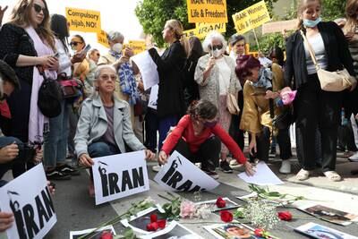 Demonstrators gather outside the Iranian embassy in Madrid. Reuters