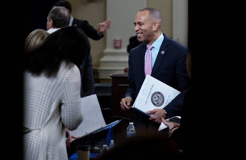 Hakeem Jeffries speaks with other members of Congress inside the room where the House Democratic leadership elections take place on Capitol Hill in Washington. Reuters