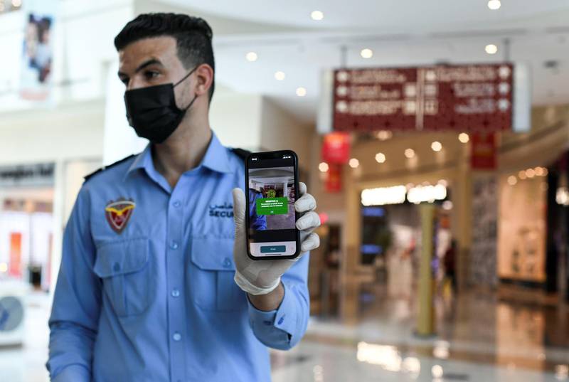 Face Scanning Detection-AD  New protocol of face scanning detection on the hand held device at Al Wahda Mall in Abu Dhabi on June 28, 2021. Khushnum Bhandari/ The National
Reporter: N/A News