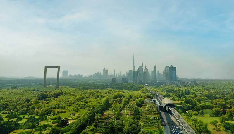 Dubai skyline and Dubai Metro.