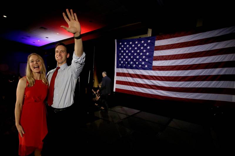 Missouri Senator-elect Josh Hawley with his wife Erin waves to supporters after giving his victory speech in Springfield, Missouri. AP Photo