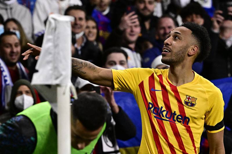 Pierre-Emerick Aubameyang points to the crowd after scoring for Barcelona against Real Madrid. AFP