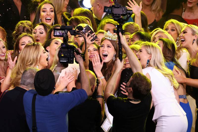 Miss Alaska, Emma Broyles, takes a selfie with contestants after being announced as the winner of the 100th Anniversary of the Miss America competition at the Mohegan Sun Arena in Uncasville, Connecticut, US, on December 16, 2021. Reuters