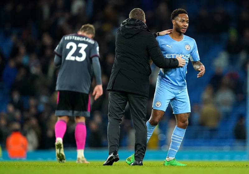 Leicester City manager Brendan Rodgers congratulates Manchester City's Raheem Sterling. PA