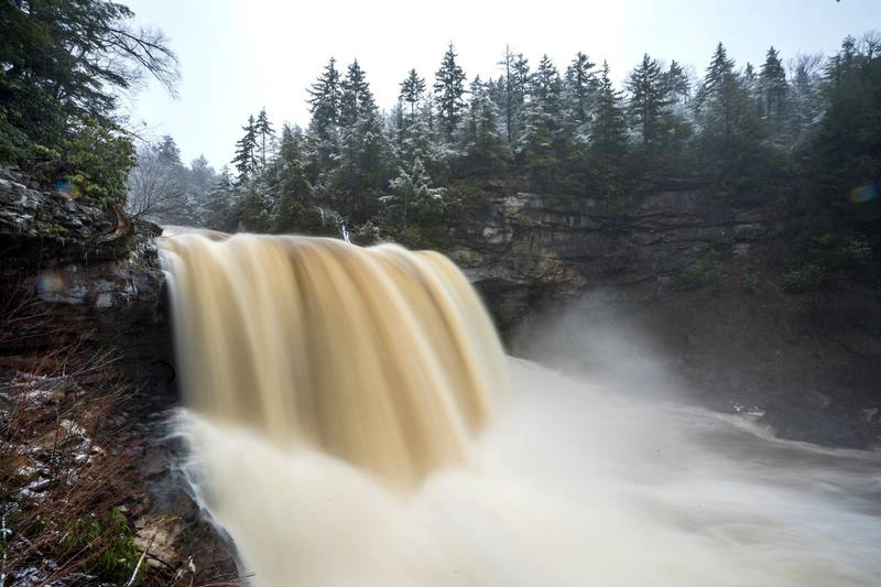 Water cascades over Blackwater Falls during a snowstorm outside Davis, West Virginia, US. The fresh wave of snow moved across the mid-Atlantic states. Jim Lo Scalzo / EPA