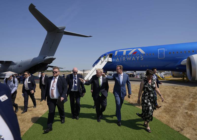 Britain's Prime Minister Boris Johnson tours Farnborough, a vital marketplace for the country's aviation industry. AP