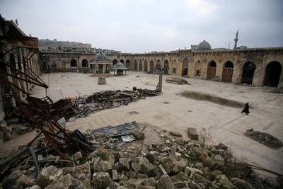 A woman walks inside Aleppo's Umayyad mosque, Syria.  Ali Hashisho / Reuters