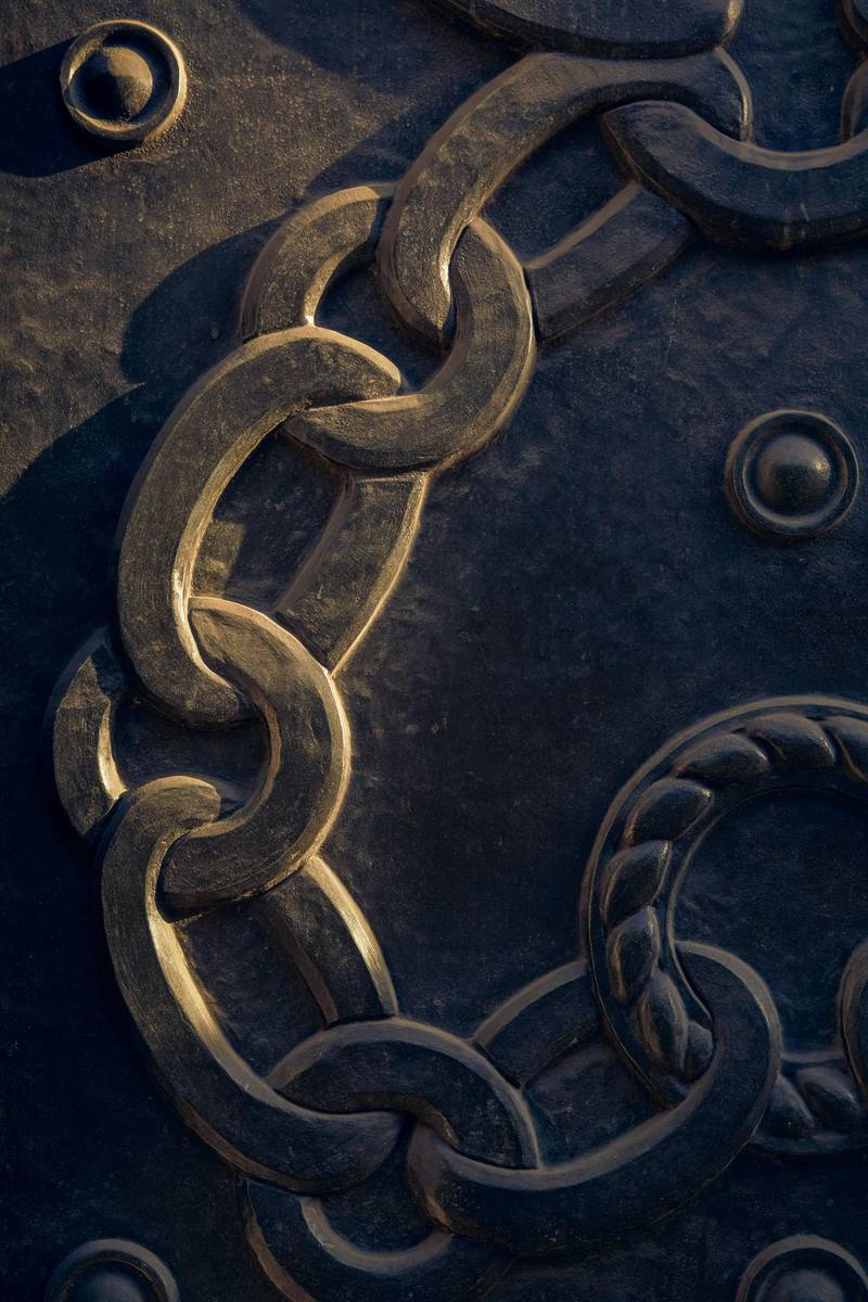 A relief on the door of the Bank of England (BOE) depicts chains, in London, UK, on June 23. Many of the financial district’s most venerable names were built off colonial oppression.  Olivia Harris / Bloomberg