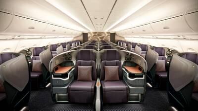 The business-class cabin has flat beds crafted from soft leather. Photo: Singapore Airlines 