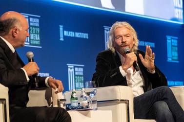 Kevin O’Leary of O’Shares ETFs shares the stage with Sir Richard Branson. Antonie Robertson / The National