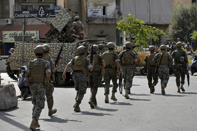 Lebanese soldiers attending the protest. AP