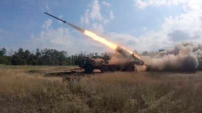 A Russian multiple-launch 'Hurricane' rocket system  in action during battles in an undisclosed area in Ukraine. EPA