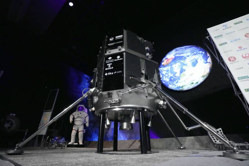 A model of the Hakuto-R lander is displayed before a live stream of the lunar landing, at the National Museum of Emerging Science and Innovation in Tokyo. AP