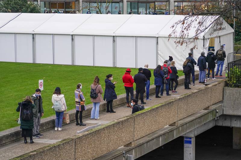 The queue outside the vaccination centre at St Thomas' Hospital in London. AP Photo
