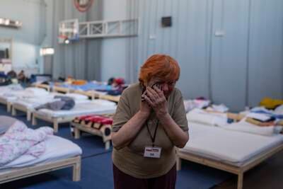 Zinaida Pivtsova, 75, who fled the war in Ukraine, takes shelter in a sports stadium in Przemysl, south-east Poland. AP