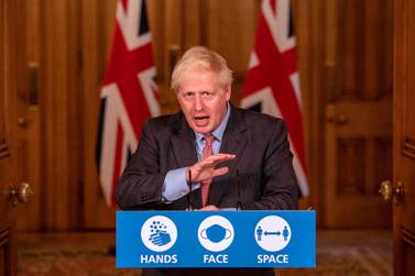 Britain's Prime Minister Boris Johnson delivers an update on the Covid-19 pandemic from 10 Downing Street on September 30, 2020. AFP