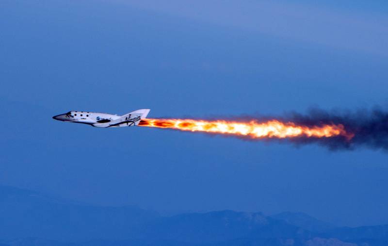 This photo provided by Virgin Galactic shows Virgin Galactic's SpaceShipTwo under rocket power, its first ever since the program began in 2005. The spacecraft was dropped from its "mothership," WhiteKnightTwo, over Mojave, Calif., on Monday, April 29, 2013. The spaceship, bankrolled by British tycoon Sir Richard Branson, made its first powered flight in a test that moves Virgin Galactic toward its goal of flying into space later this year. While SpaceShipTwo did not break out of the atmosphere during the test flight, it marked a significant milestone for Virgin Galactic, which intends to take passengers on suborbital joyrides. (AP Photo/Virgin Galactic, Mark Greenberg) *** Local Caption ***  Space Tourism.JPEG-0db75.jpg