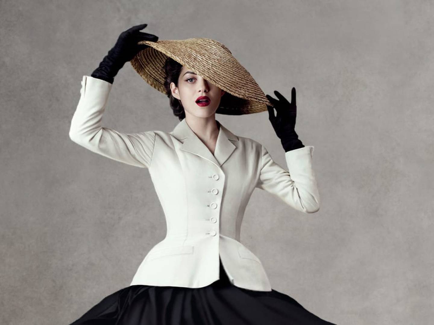 Marion Cotillard models Christian Dior's now famous Bar jacket. Photo: Dior