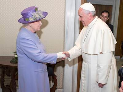 Pope Francis welcomes Britain's Queen Elizabeth II for a private audience in Rome, April 2014. Getty Images