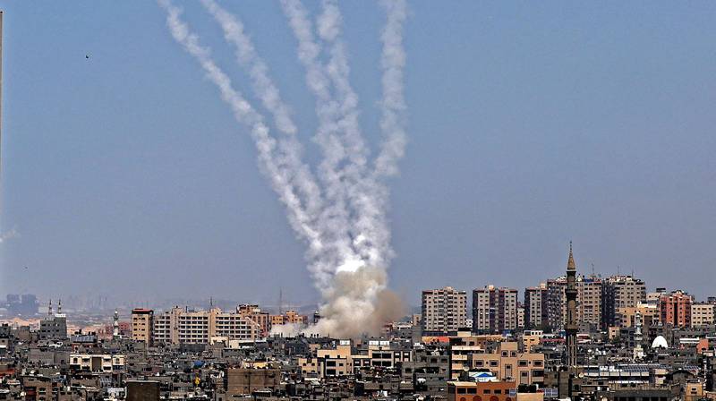 Rockets are fired from Gaza City, which is controlled by the Palestinian Hamas movement, towards Israel, on Tuesday. AFP