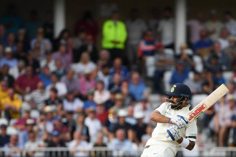 India's captain Virat Kohli plays a shot during the first day of the third Test cricket match between England and India at Trent Bridge in Nottingham, central England on August 18, 2018. (Photo by Paul ELLIS / AFP) / RESTRICTED TO EDITORIAL USE. NO ASSOCIATION WITH DIRECT COMPETITOR OF SPONSOR, PARTNER, OR SUPPLIER OF THE ECB