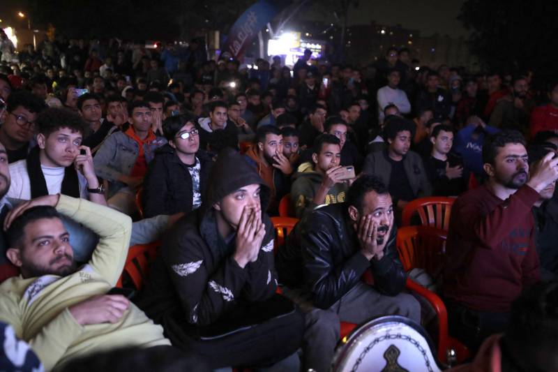 Egypt fans look dejected as they watch the World Cup 2022 play-off against Senegal in Cairo. Reuters