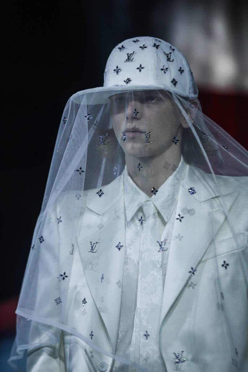 Breaking from the norm, Abloh offered a male 'bride', complete with logo-ed veil. Courtesy EPA