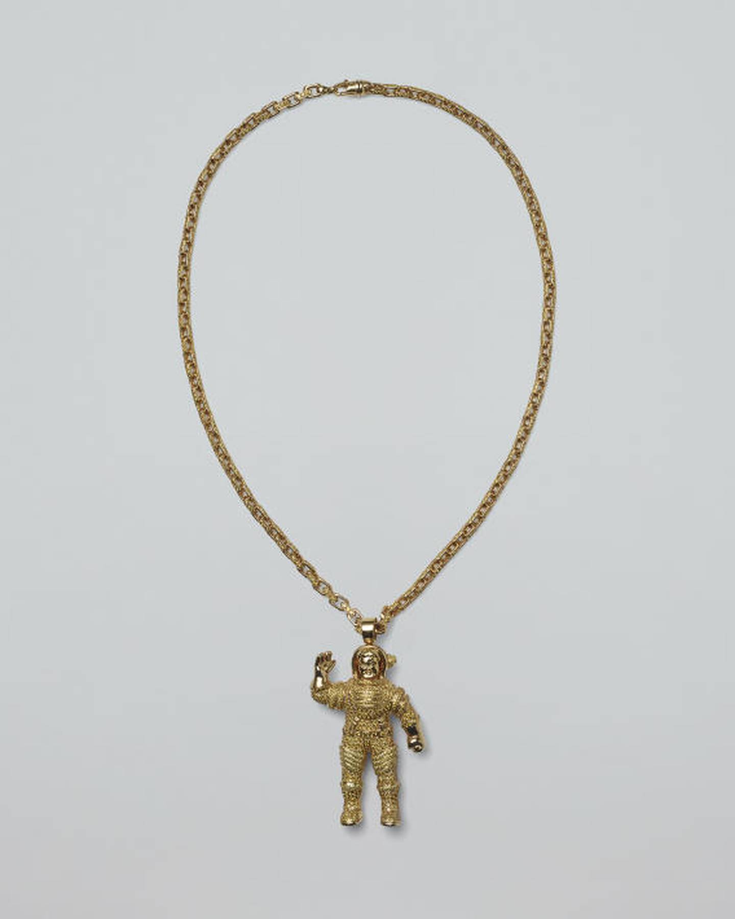 Gold Astronaut Pendant, $56,000 by Jacob & Co. Made for Pharrell Williams, worn to the Versace Spring 2004 Haute Couture Show. Photo: “Joopiter.”