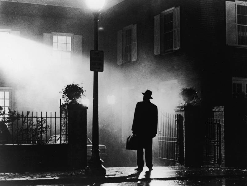 A silhouette of a man stands in front of a house at night in a still from the film,' The Exorcist', directed by William Friedkin, 1973. (Photo by Warner Bros./Courtesy of Getty Images)
