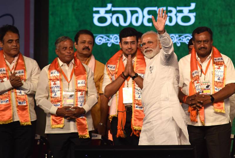 epa07504325 Indian Prime Minister Narendra Modi (2-R) of Bharatiya Janata Party (BJP), along with BJP leaders and party workers during the election rally meeting in Bangalore, India, 13 April 2019. Polling for the upcoming general elections across India will be held from 11 April 2019 onwards in seven phases with counting of votes scheduled to take place on 23 May 2019.  EPA/JAGADEESH NV