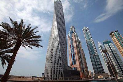 The Infinity Tower in Dubai. The emirate's property market has drawn capital from around the region over the past two years. Ali Haider / EPA