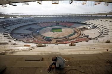 A worker is pictured at the construction site of Sardar Patel Gujarat Stadium, which according to local media is the largest cricket stadium in the world with a seating capacity of around 110,000, in Ahmedabad, India, December 12, 2019. REUTERS/Amit Dave TPX IMAGES OF THE DAY