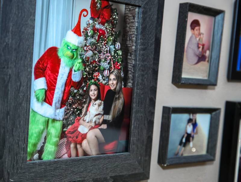 Joe dresses up as The Grinch for a family photo taken in 2019