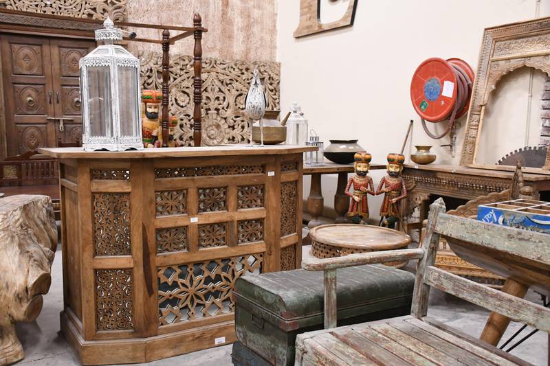 The wooden furniture in Lucky is shipped over from India.
