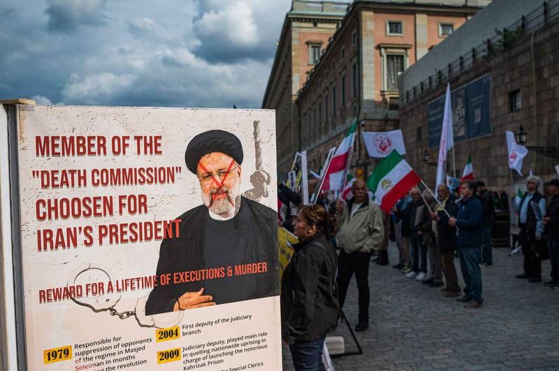 People protest outside the Swedish Parliament in Stockholm over the death Mahsa Amini in Tehran. AFP