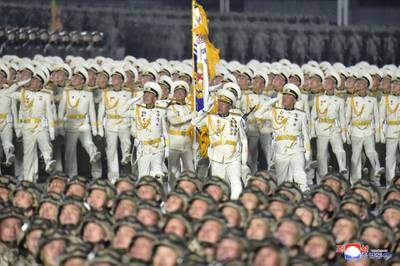 This picture taken on January 14, 2021 and released from North Korea's official Korean Central News Agency (KCNA) on January 15 shows a military parade celebrating the 8th Congress of the Workers' Party of Korea (WPK) in Pyongyang. (Photo by - / KCNA VIA KNS / AFP) / - South Korea OUT / REPUBLIC OF KOREA OUT   ---EDITORS NOTE--- RESTRICTED TO EDITORIAL USE - MANDATORY CREDIT "AFP PHOTO/KCNA VIA KNS" - NO MARKETING NO ADVERTISING CAMPAIGNS - DISTRIBUTED AS A SERVICE TO CLIENTS
THIS PICTURE WAS MADE AVAILABLE BY A THIRD PARTY. AFP CAN NOT INDEPENDENTLY VERIFY THE AUTHENTICITY, LOCATION, DATE AND CONTENT OF THIS IMAGE. / 