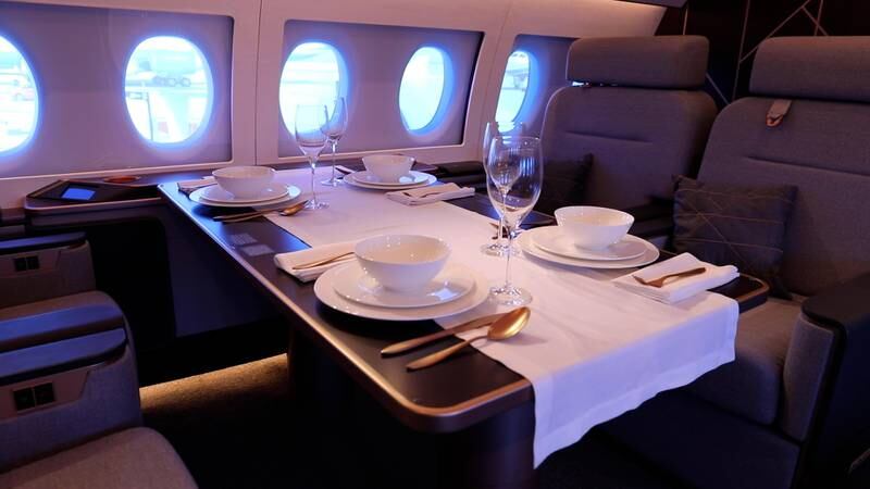 Spacious dining facilities on-board the Irkut jet.