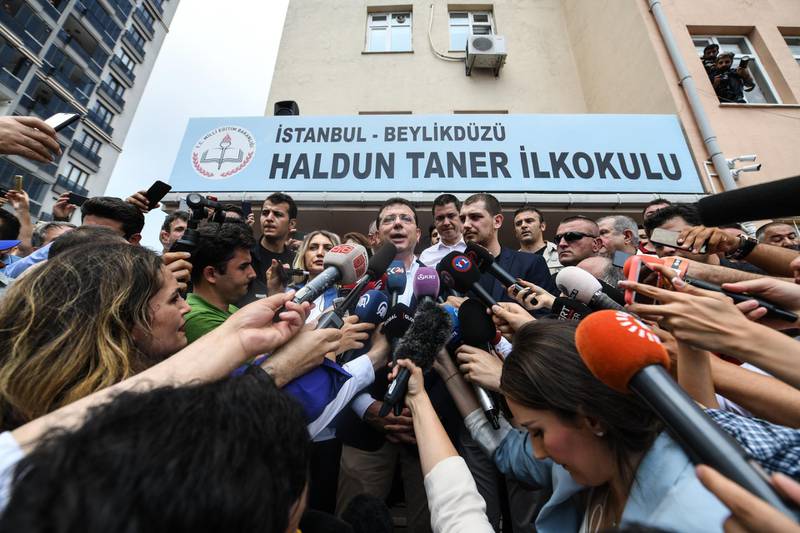 Istanbul mayoral candidate Ekrem Imamoglu of the CHP greets his supporters after casting his vote in a polling station in the re-run local mayoral elections for Istanbul on June 23, 2019 in Istanbul, Turkey.  Burak Kara / Getty Images