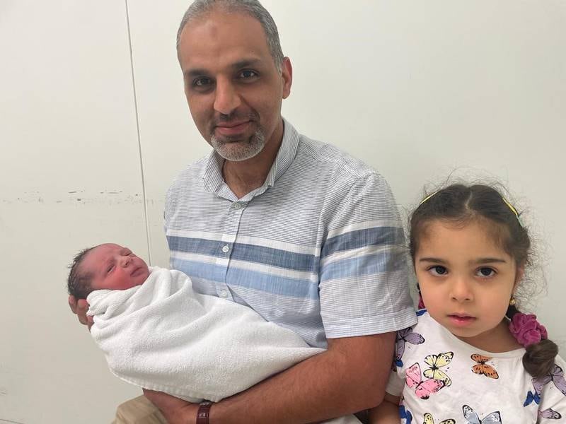 Yousuf was born at 2.03am to an Iraqi family who arrived in the UAE only four months ago. He is pictured with his father, Dr Mustafa Alobaidi, an orthopaedic surgeon, and sister, Sama, 3. Photo: NMC Royal Hospital Sharjah