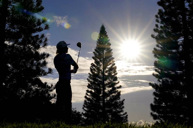 Cameron Smith plays his shot from the 18th tee during the third round of the Tournament of Champions golf event, at the Plantation Course in Kapalua, Hawaii. AP